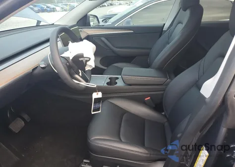 2023 Tesla Model Y from USA, damaged, VIN 7SAYGDED6PF959824